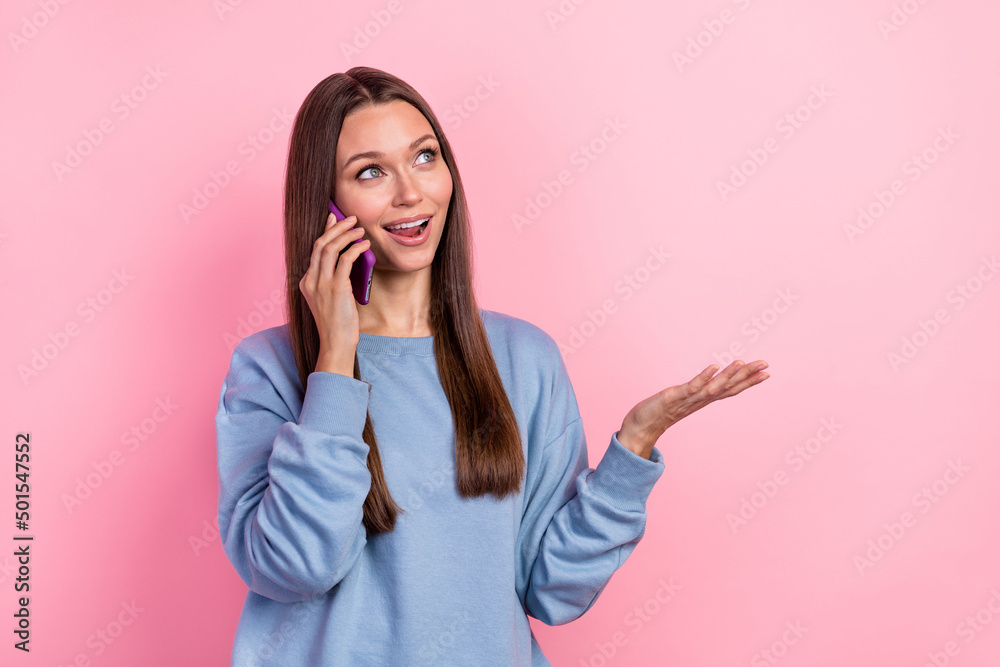 Portrait of attractive cheerful girl using device talking bla roaming cellular isolated over pink pastel color background Portrait of attractive cheerful girl using device talking bla roaming cellular isolated over pink pastel color background