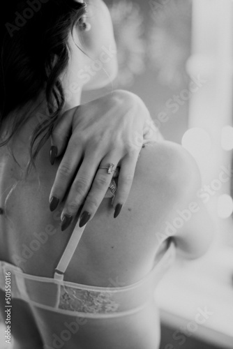 Beautiful woman in a delicate white lingerie