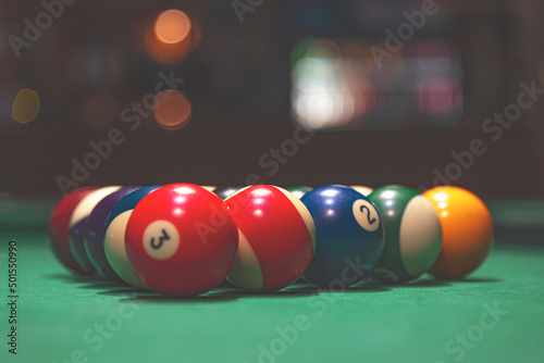 Billiards. Billiard balls in a green billiard table.
