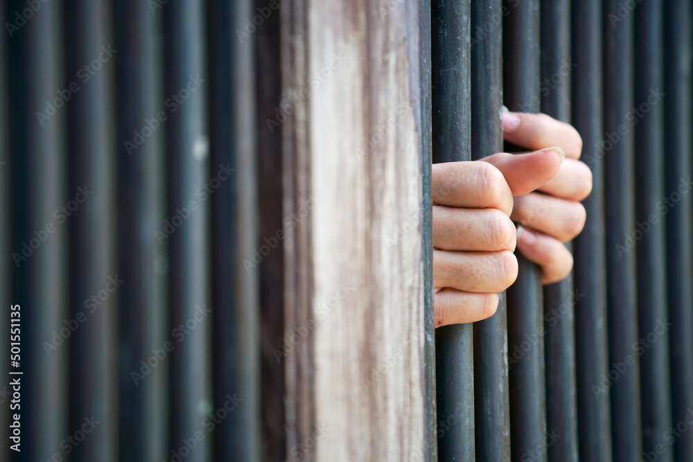 Obraz premium hands in jail