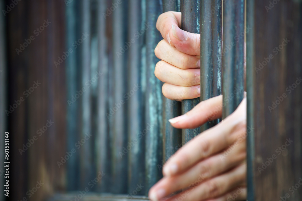 Obraz premium hands in jail
