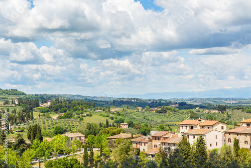 Tuscan landscape view of rolling hills from a village