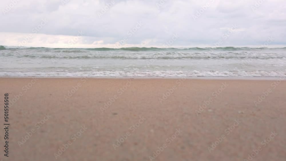 slowmotion of natural sea wave water with foam on the sandy beauty white beach, summer beach seascape slowmotion of natural sea wave water with foam on the sandy beauty white beach, summer beach seascape
