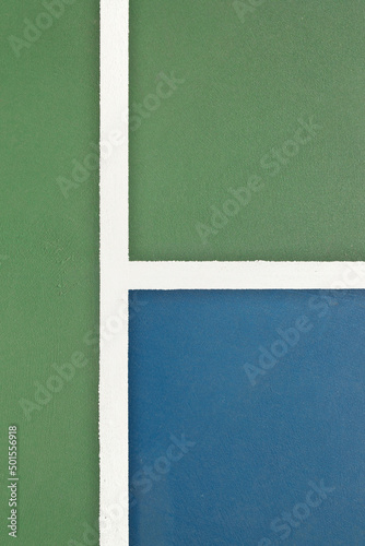 Blue and green tennis, paddle ball, basketball, pickleball court sports and recreation concept