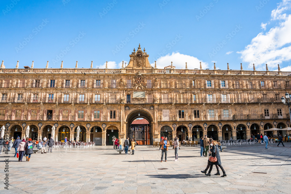 Salamanca, Spain - november 6 2022 - Tourist and locals crossing the Plaza Mayor (Major Square) in the center of town