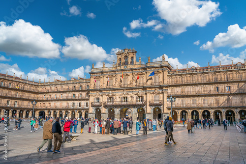 Salamanca, Spain - november 6 2022 - Tourist and locals crossing the Plaza Mayor (Major Square) in the center of town