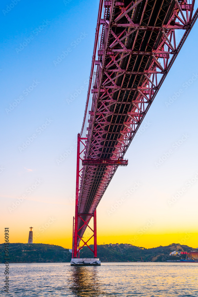 Lisbon, Portugal - november 14 2022 - Detail of the Bridge of april 25th (Ponte 25 de Abril) crossing the Duoro river