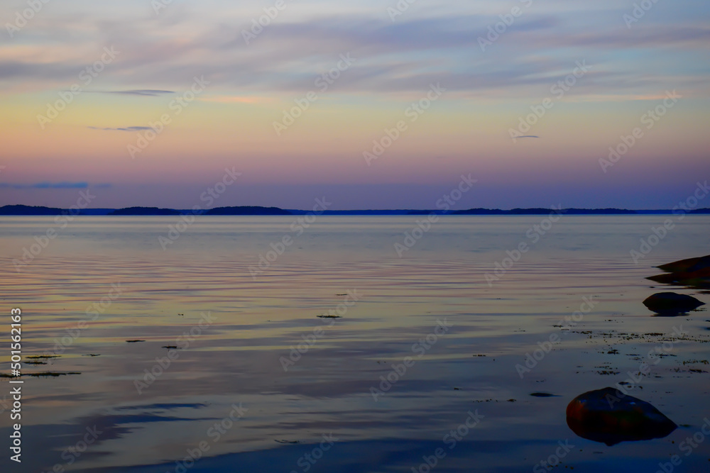Blue violet sunset over a lake in Sweden.