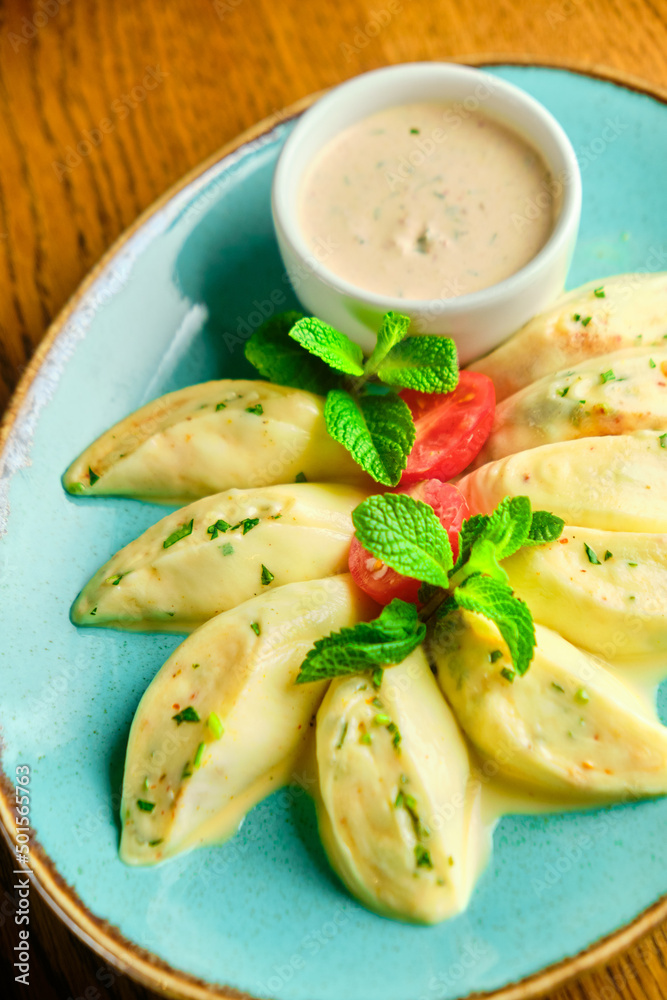 Dumplings di patate with basil and tomato sauce