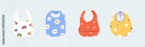 Cute bib set for baby feeding. Breastplate with various playful patterns like rainbow, flowers, heart, stars. Different types of apron from textile, silicone, tissue. All items are isolated