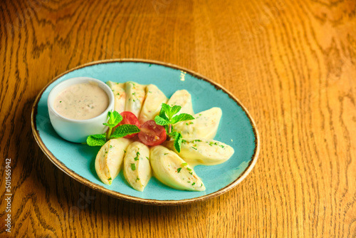 Dumplings di patate with basil and tomato sauce