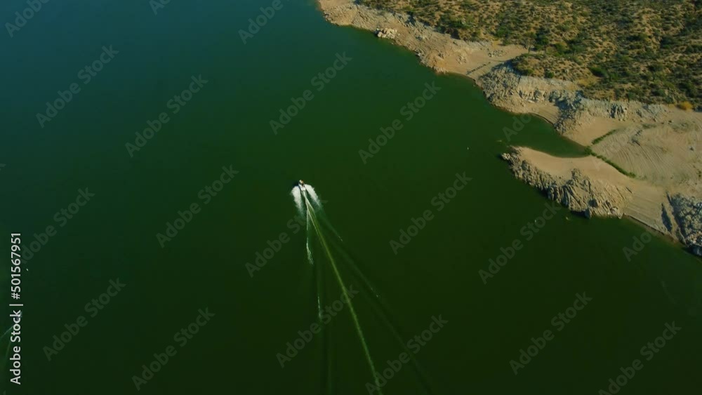 4k High Definition Drone video of the mountains, beaches, cacti, real estate and dam in Bartlett Lake, Arizona.