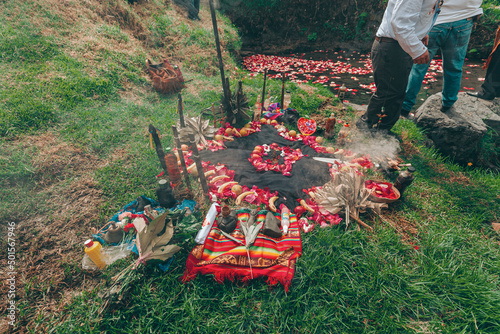 Ritual andino del Tumarina que se celebra durante la época del Pawkar Raymi o Celebración del florecimiento en la comunidad de Peguche, Ecuador. photo