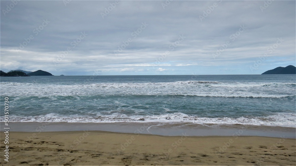 Beach landscape with the sky and the sea on the horizon