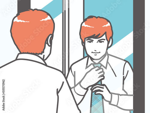鏡の前でネクタイを締める男性
