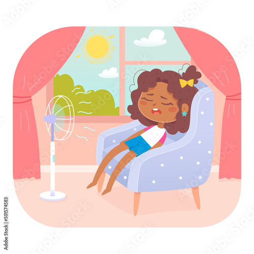 Cute girl cooling in summer heat, funny kid sitting in home armchair near blowing fan