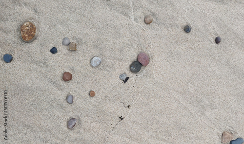 stones on the sand. Coast of the Baltic Sea. Curonian Spit, Kaliningrad region, Russia. Beach.