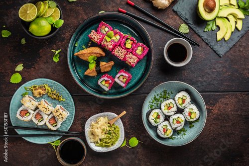 japanese sushi food. Maki ands rolls with tuna  salmon  shrimp  crab and avocado. Top view of assorted sushi. Rainbow sushi roll  uramaki  hosomaki and nigiri. 