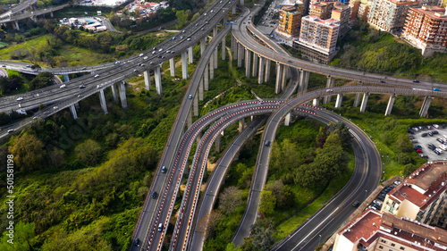 Aerial view of the ring road of Naples, Italy, near the Vomero exit. Many cars travel on the motorway junction.