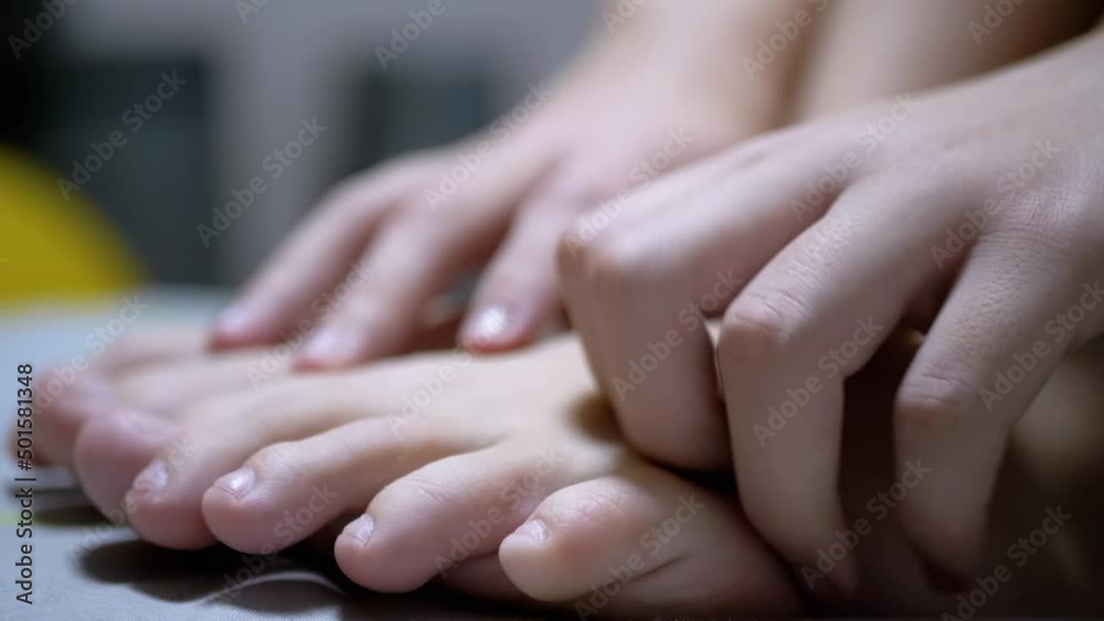 Child Hands Massage Skin the Toe, and Little Fingers. Close-up. Self-massage. Pressing on acupuncture points feet with fingers. Reflex, relaxing massage. Effective treatment, help with tired legs. 4K. Child Hands Massage Skin the Toe, and Little Fingers. Close-up. Self-massage. Pressing on acupuncture points feet with fingers. Reflex, relaxing massage. Effective treatment, help with tired legs. 4K.