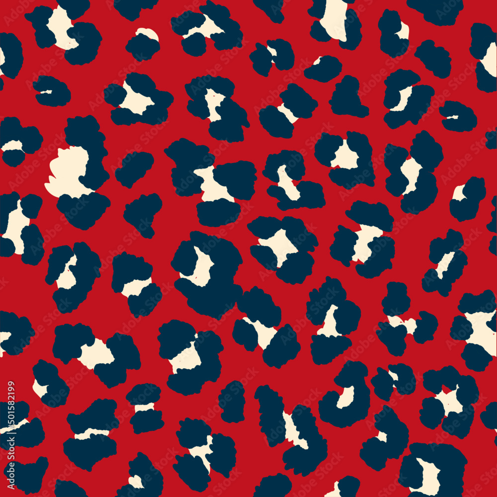 Seamless leopard pattern print in deep red, navy and off-white. 