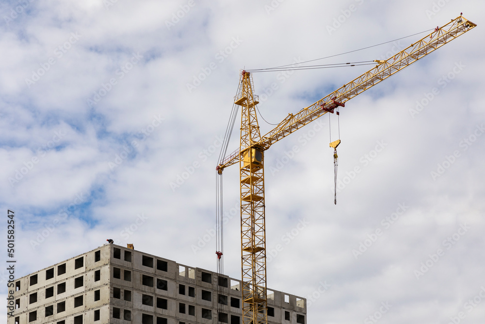 Russia. Saint-Petersburg. Construction of a multi-storey residential building. Construction equipment.