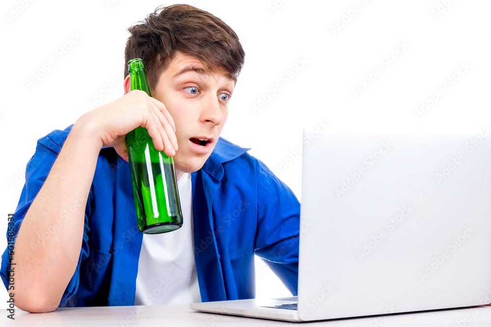 Surprised Young Man with Laptop