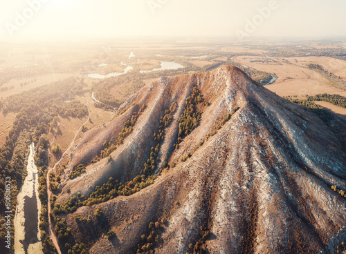 Aerial view of Mount Shikhan Yuraktau - an ancient coral reef and a deposit of sodium carbon dioxide and a popular tourist destination photo