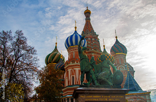 Minin and Pojarskii monument and St Basil`s cathedral on Red Square, Moscow, Russian Federation