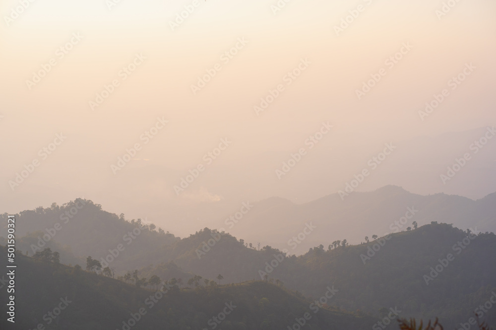 Fototapeta premium silhouette and panorama layer of mountain with sunset background