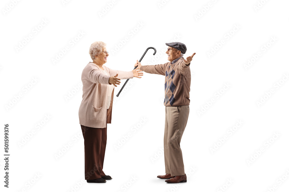 Full length profile shot of an elderly man and woman with arms wide open for a hug Full length profile shot of an elderly man and woman with arms wide open for a hug