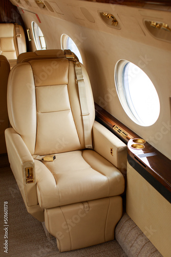 Private jet interior, leather armchairs