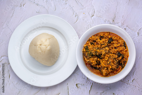 Top shot of served Egusi soup and fufu or pounded yam