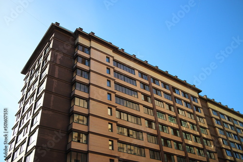 view of a modern high-rise building at an acute angle