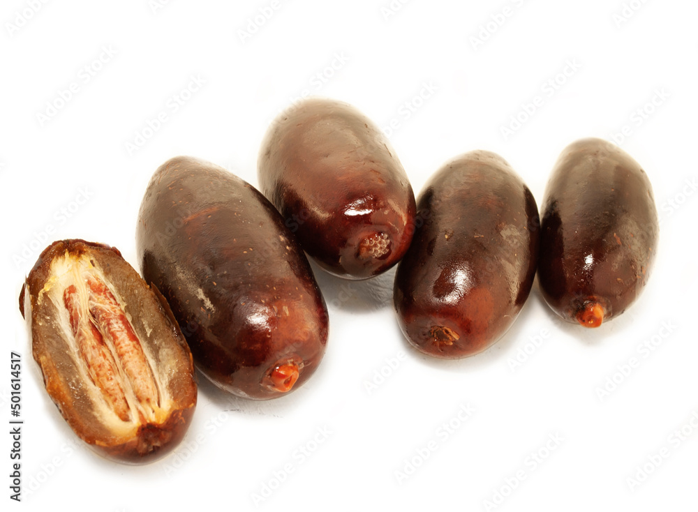 Fresh royal big dates around white background. close up Fresh royal big dates around white background. close up