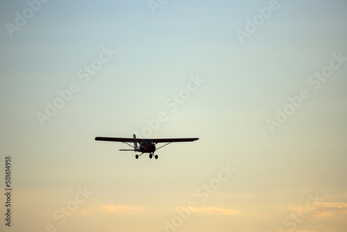 Small private propeller plane flies in the sky © VP