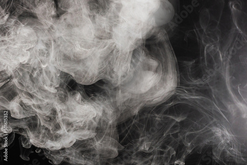 White steam on a black background.