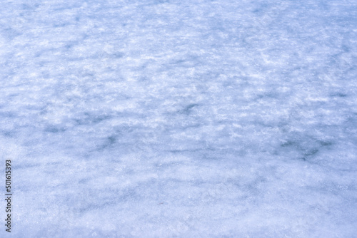 Natural texture of ice, frozen lake as background.