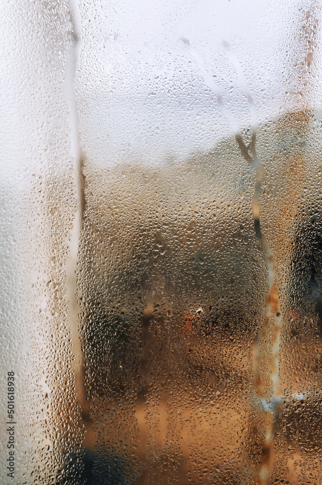 Background, texture of a drop of water and from the rain on the glass. Photography, abstraction.