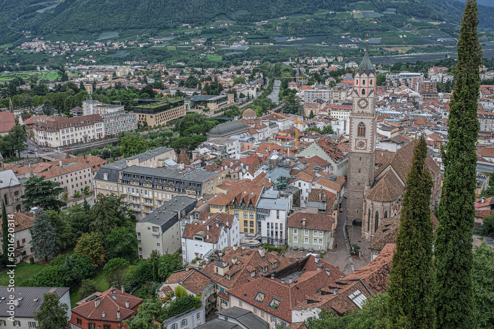 Aerial view of Old  Steinach Quarter and New Merano with St. Nicholas Cathedral on the  Cathedral Square and Passirio River in the background, Merano, South Tyrol, Italy.