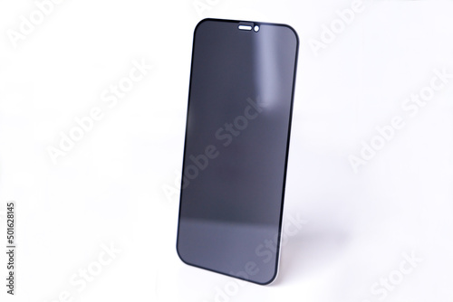 Protective glass for smartphone screen on white background