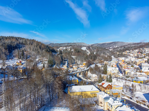 Aerial view of Tanvald on sunny winter day photo