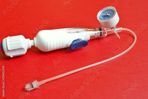 A balloon inflation device used in angioplasty procedure photo