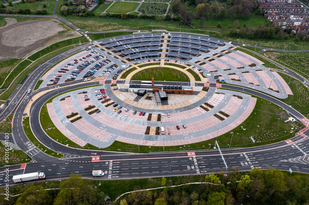 Aerial view of an innovative Park and Ride location with innovative solar panels on air park rooftops