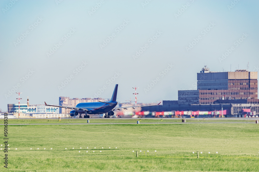 Fototapeta premium Passenger plane in the airport.