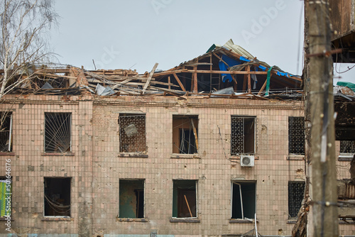 War of Russia against Ukraine. Residential building damaged by enemy aircraft in Ukrainian. Consequences of war, damaged grocery market by troops of Russian army. private house destroyed.