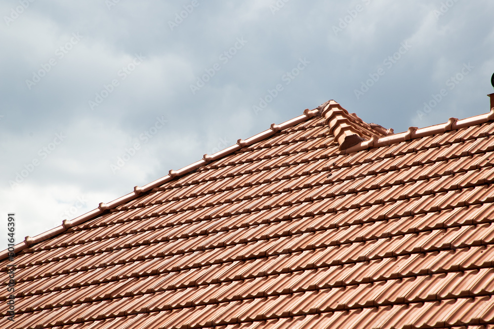 new red tiles roof and blue sky