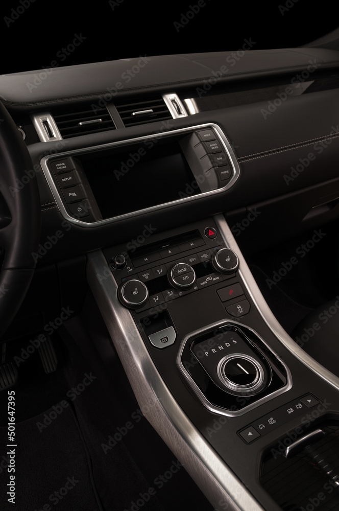 Car control panel. Interior detail. Vertical photo. View from driver seat.