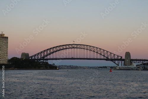 Sunset in Sydney Harbour Bridge in Australia. Travelling during corona pandemic. © Mona
