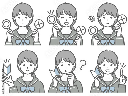 〇✕マークや初心者マークを持つ女子学生